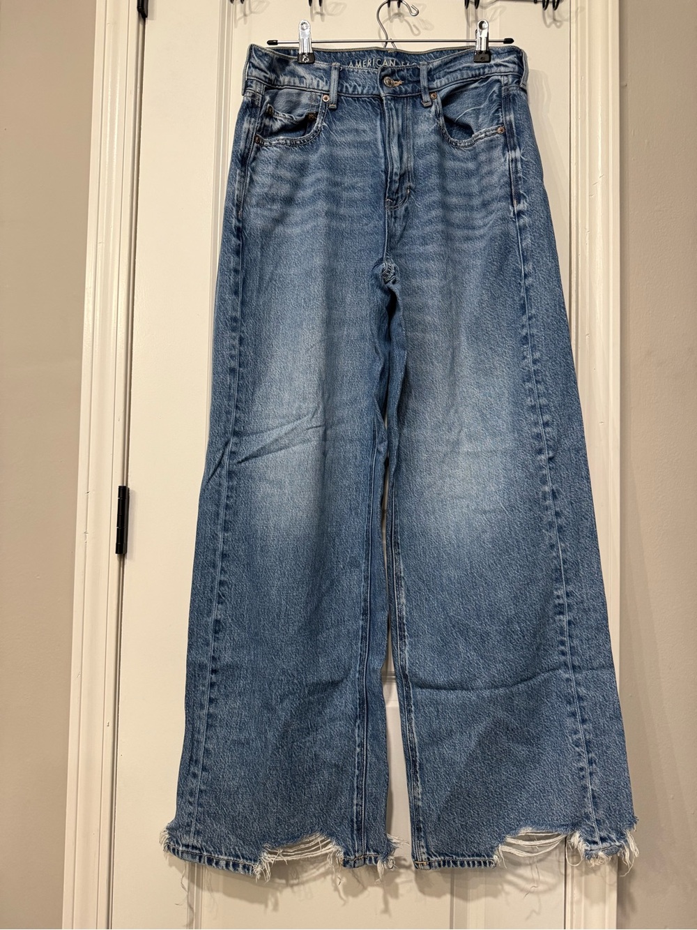 American Eagle Outfitters Wide Leg Frayed Hem Jeans in Light Blue Denim